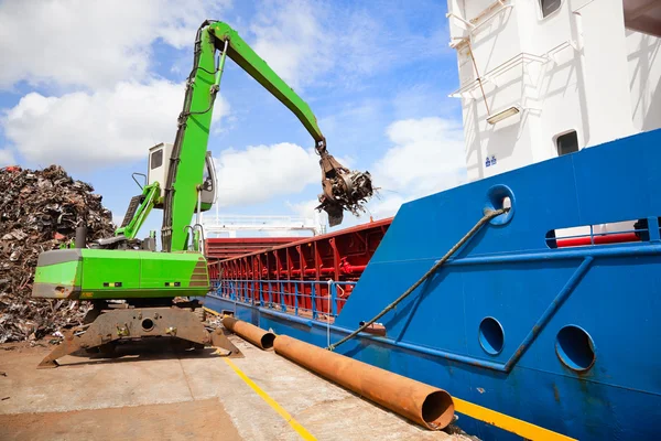 Crane Loading ship with steel Stock Picture