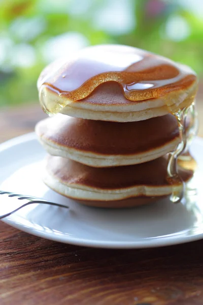 stock image Pancakes on a plate with syrup