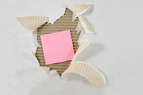 Post-It Note attached Torn Ripped Corrugated Cardboard — Stock Photo, Image