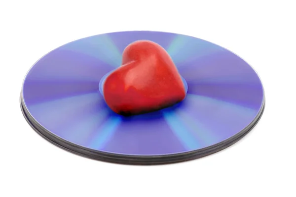 Cd disk içinde kırmızı kalp — Stok fotoğraf