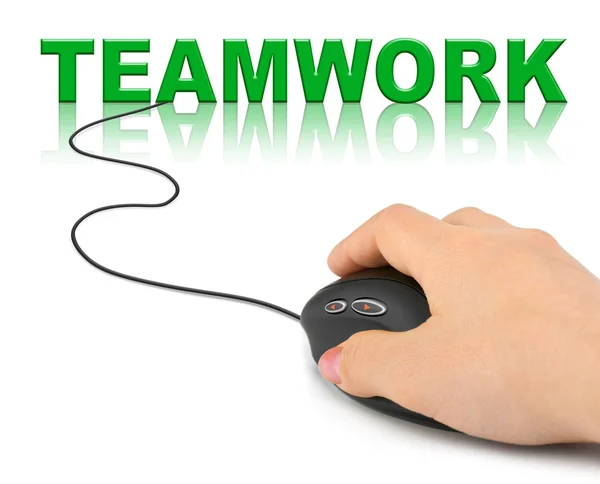 Hand met computer muis en woord teamwork — Stockfoto