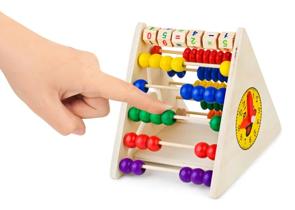 Hand och abacus — Stockfoto