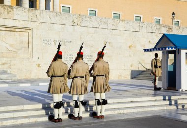 Changing guards near parliament at Athens clipart