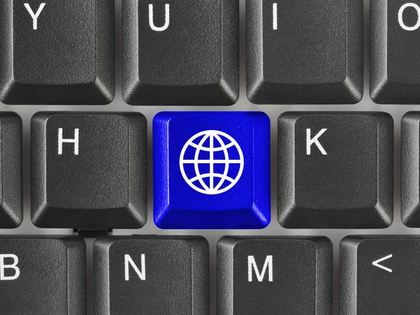Bilgisayar klavye ile dünya anahtar — Stok fotoğraf