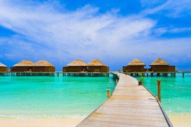 Water bungalows and pathway clipart