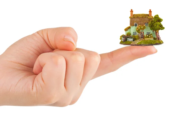Hand en klein huis — Stockfoto