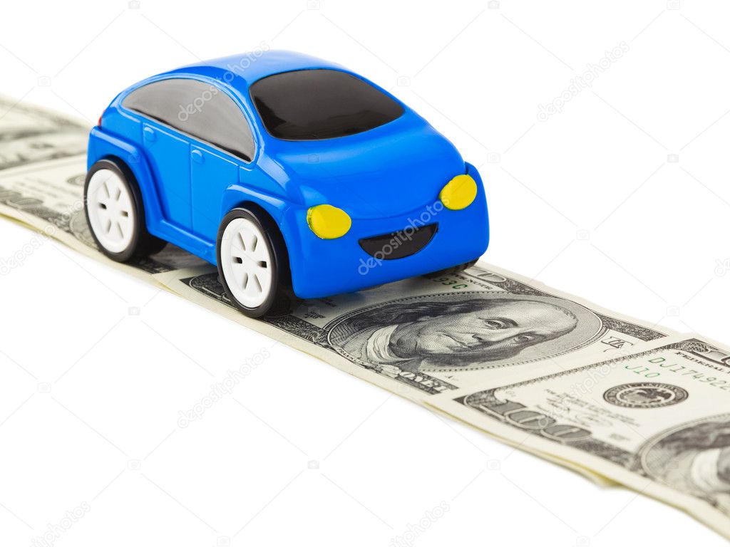 Toy car on money road