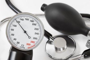 Scale of pressure and stethoscope clipart