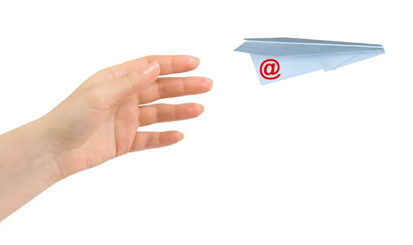 Hand and flying mail plane — Stock Photo, Image