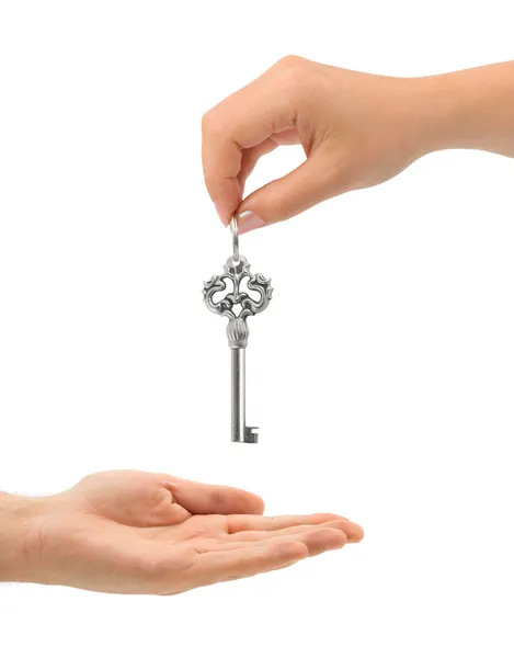 Hands and key — Stock Photo, Image