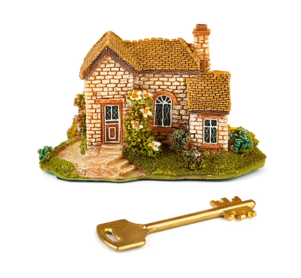 Casa de brinquedo e chave — Fotografia de Stock