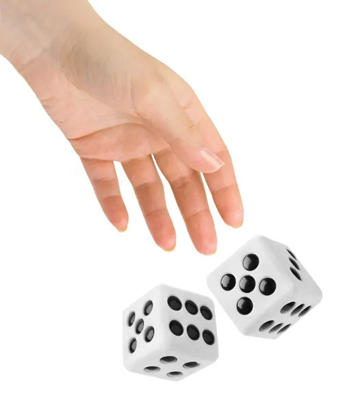 Hand throwing two dices — Stock Photo, Image