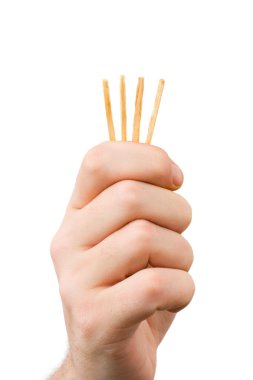 Hand and matches - draw lots clipart