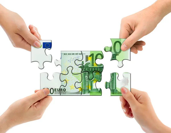 Hands and money puzzle — Stock Photo, Image