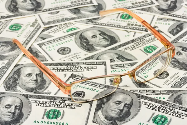 Glasses on money — Stock Photo, Image