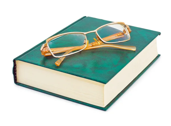 Книга і окуляри — стокове фото