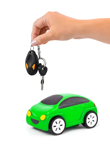 Hand mit Schlüssel und Auto — Stockfoto