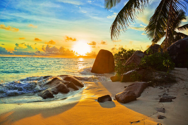 depositphotos_6162524-stock-photo-tropical-beach-at-sunset.jpg