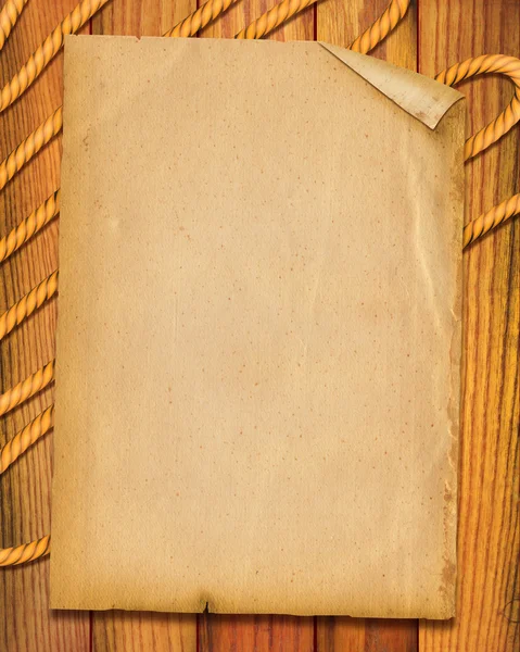 Fondo de papel viejo con cuerda en escritorio de madera — Foto de Stock