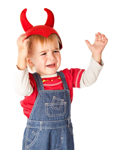 Egy síró fiú egy vicces kalap — Stock Fotó