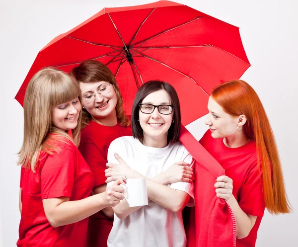 Девушки под зонтиком — стоковое фото