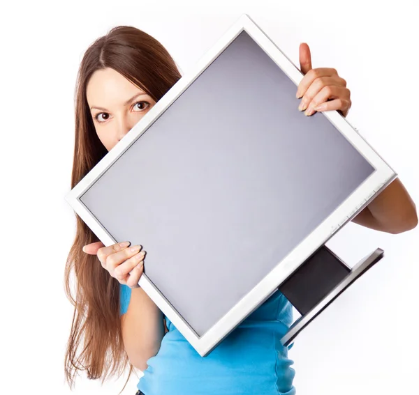Młoda kobieta trzyma monitora — Zdjęcie stockowe
