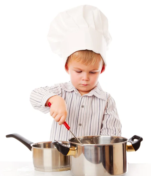 Забавный мальчик изображает повара — стоковое фото