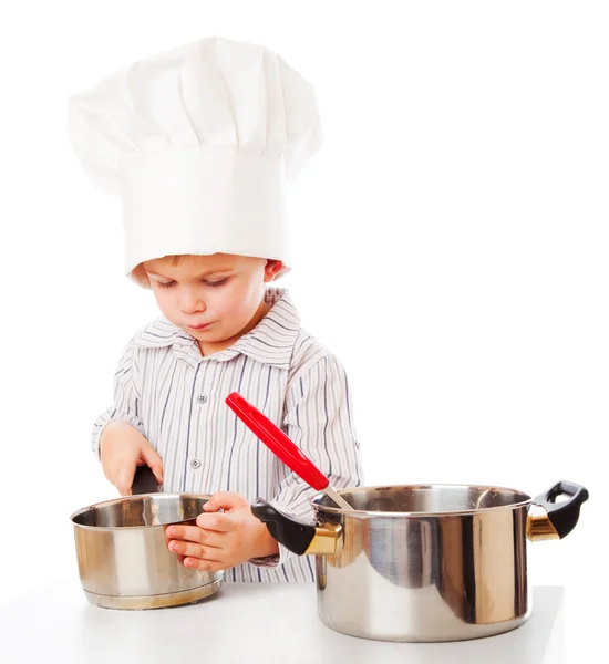 A funny boy is portraying a cook — Stock Photo, Image