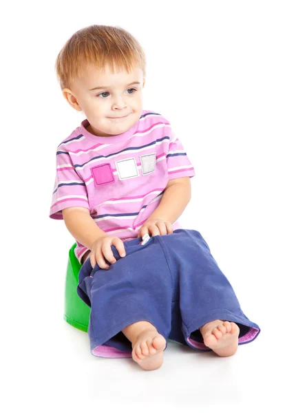 Pot oturan bir çocuk — Stok fotoğraf
