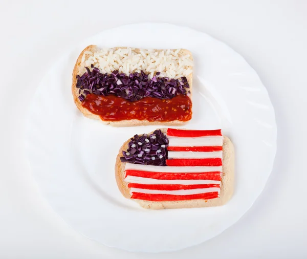 Sandwiches with flags of two countries — Stock Photo, Image