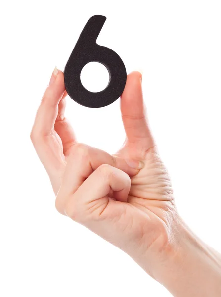 A number six in the hand — Stock Photo, Image