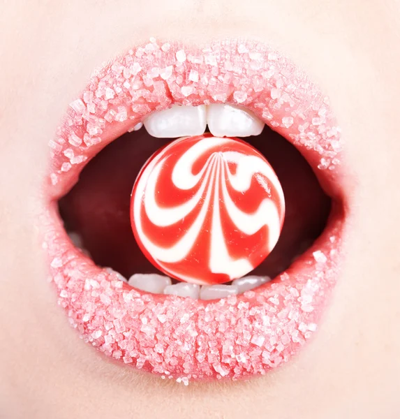 A lollipop in the mouth — Stock Photo, Image