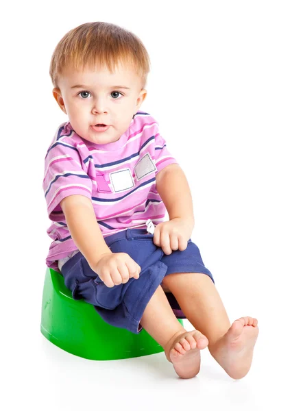 Chłopiec siedzi na pot — Zdjęcie stockowe