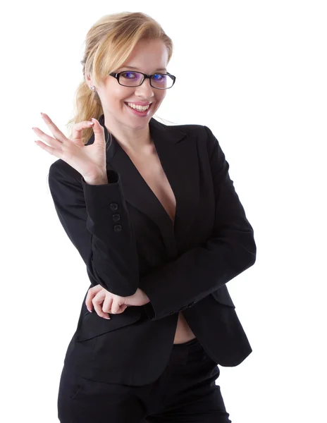 Uma mulher de negócios sorridente em mostrar "O.K ." — Fotografia de Stock