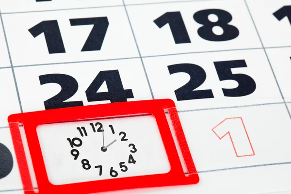 Close up of calendar page with clock — Stock Photo, Image