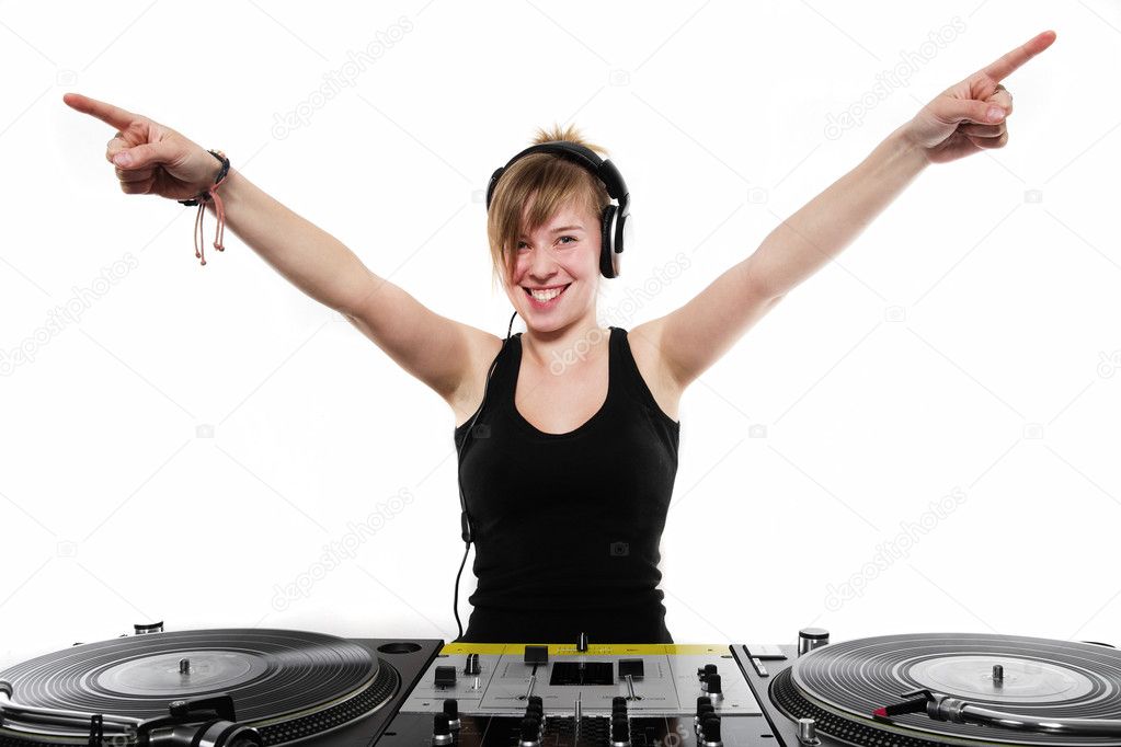 Young girl DJ posing at the turntables