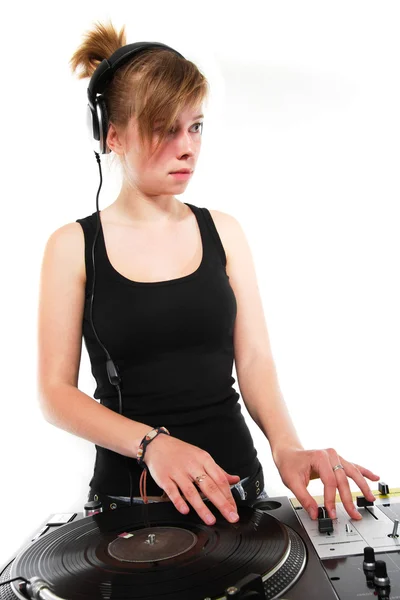 Isolated young female Dj playing vinyl — Stock Photo, Image