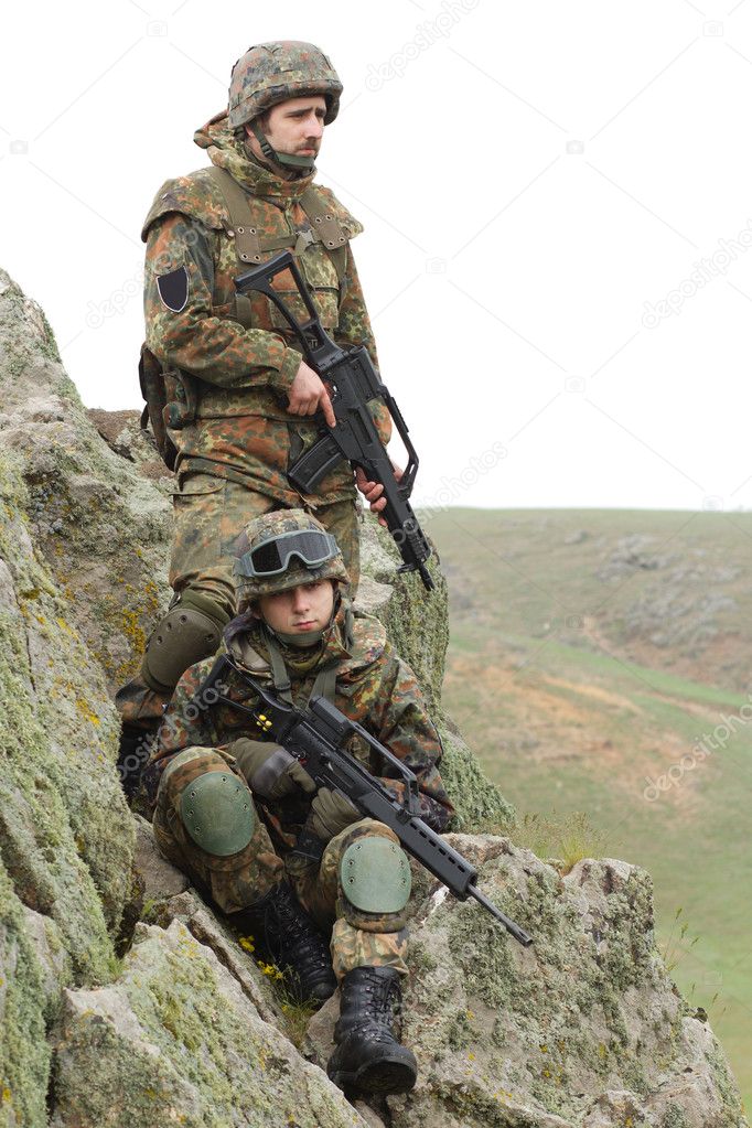 Soldiers in heavy combat ammunition