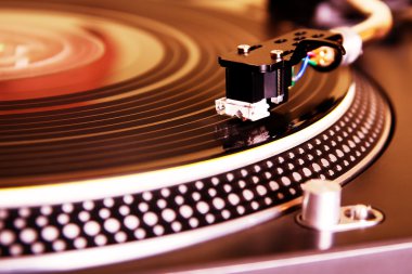 Turntable playing vinyl record clipart