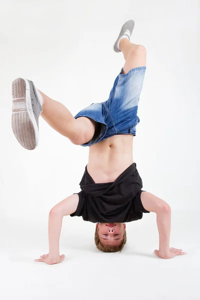 Stock image Teen b-boy spining on his head