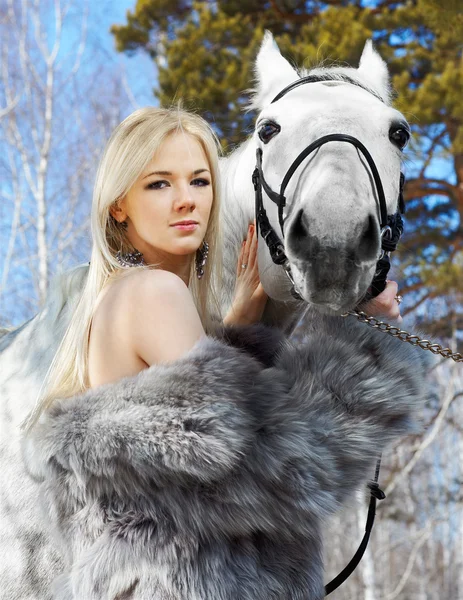 Beautiful girl with horse