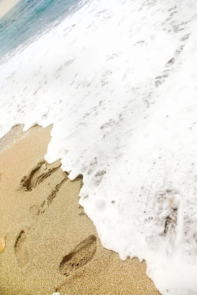 Foot steps on beach — Stock Photo, Image