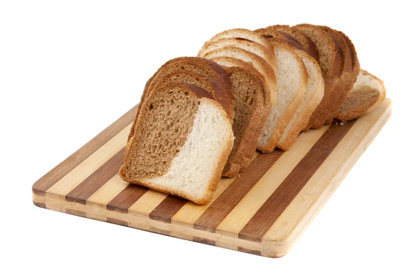 Krájený chléb na prkně — Stock fotografie