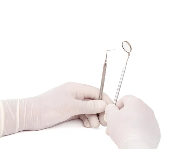 Dental instrument in the hands — Stock Photo, Image