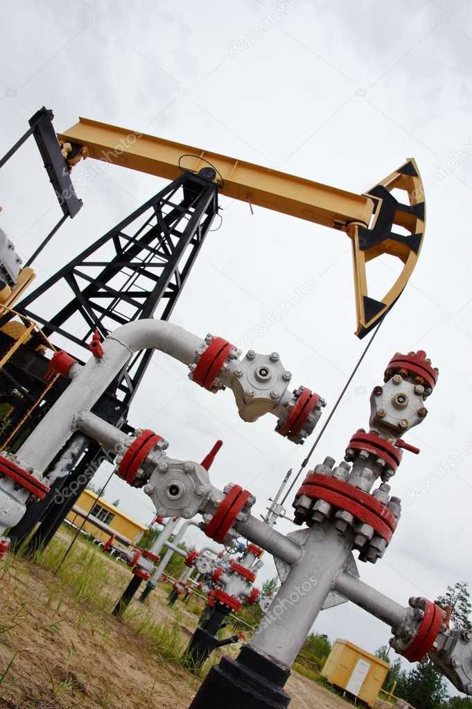 Pumpjack and oilwell.