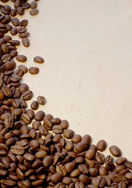 Kahve çekirdeği bir grunge arka planda — Stok fotoğraf