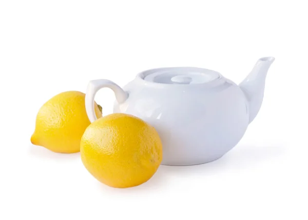 White teakettle and lemons — Stock Photo, Image