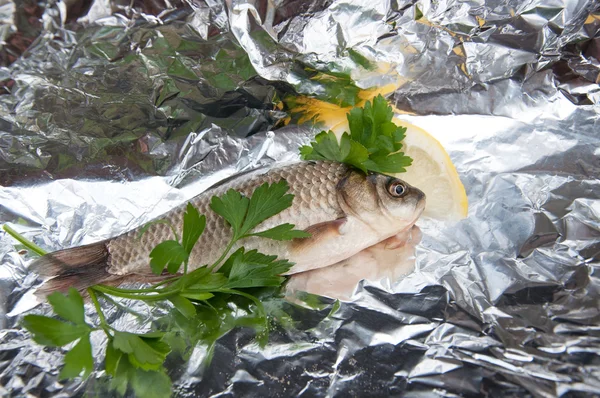Fish in foil — Stock Photo, Image