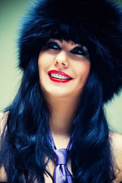 Woman in fur cap — Stock Photo, Image