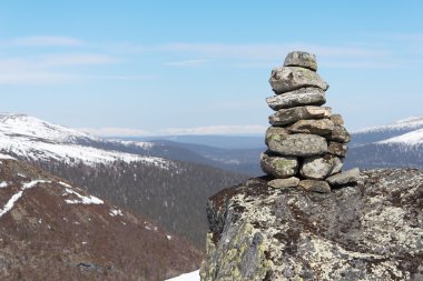 Cairn in the mountains clipart